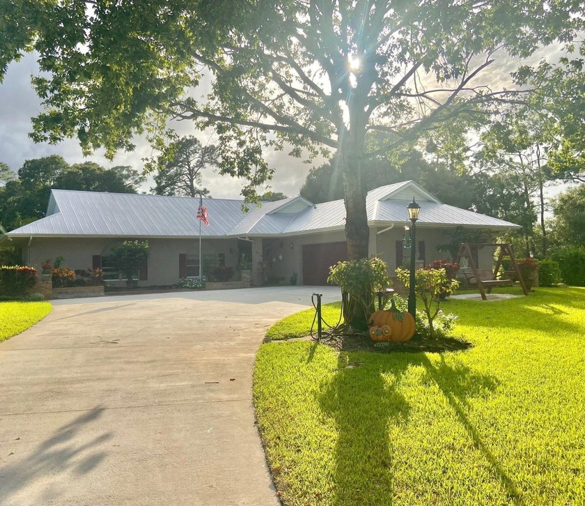 Welcome to your own little private paradise in this 3 bedroom, 2 - Beach Home for sale in Fort Pierce, Florida on Beachhouse.com