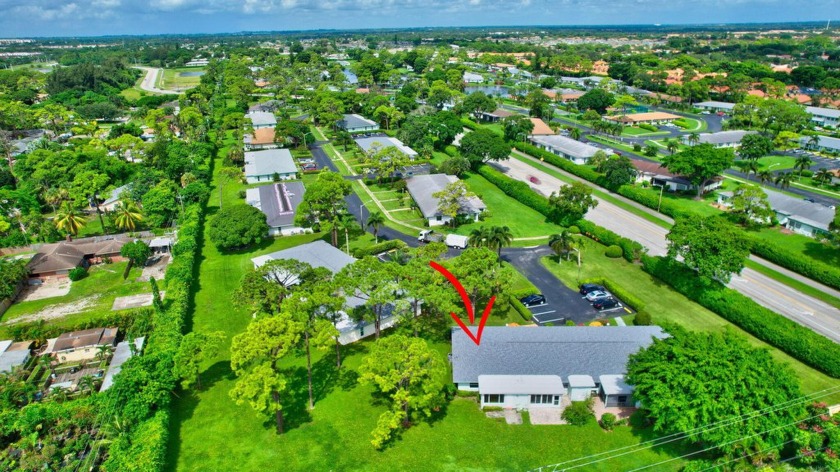 Discover this charming end-unit villa at 5020 Petal Place D - Beach Home for sale in Delray Beach, Florida on Beachhouse.com