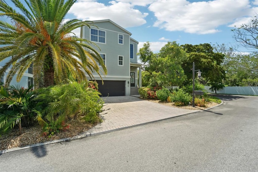 Live the ultimate Beach lifestyle! This three bedroom, three - Beach Home for sale in Longboat Key, Florida on Beachhouse.com