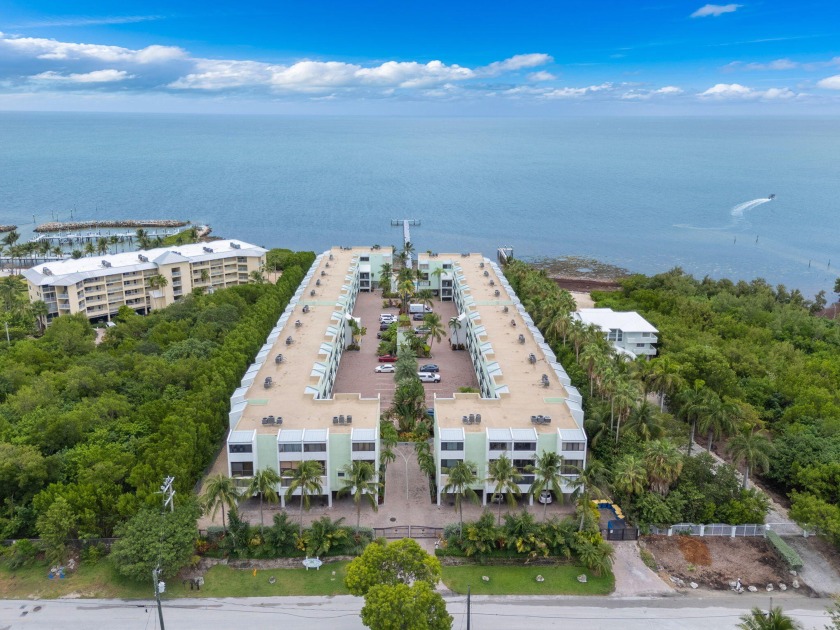 LIVE THE DREAM IN THIS OCEANFRONT RESORT STYLE PROPERTY IN THE - Beach Home for sale in Plantation Key, Florida on Beachhouse.com