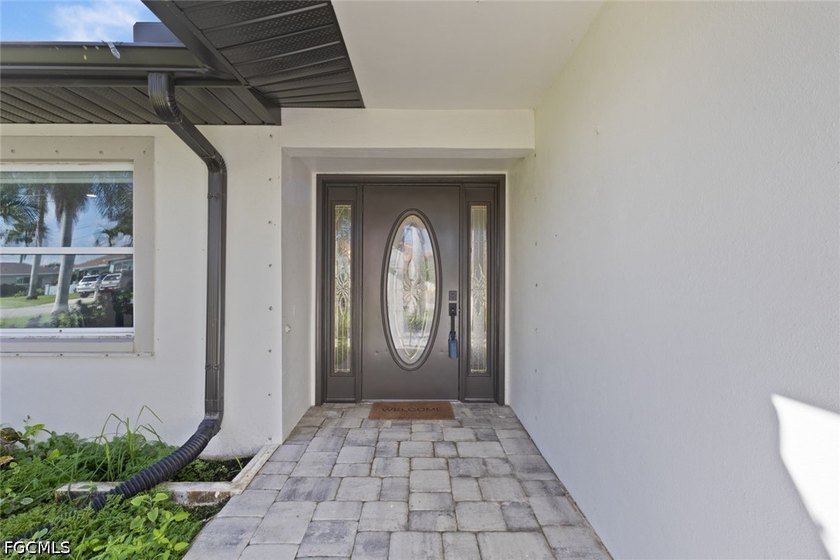 Welcome to your fully renovated waterfront retreat in the heart - Beach Home for sale in Cape Coral, Florida on Beachhouse.com