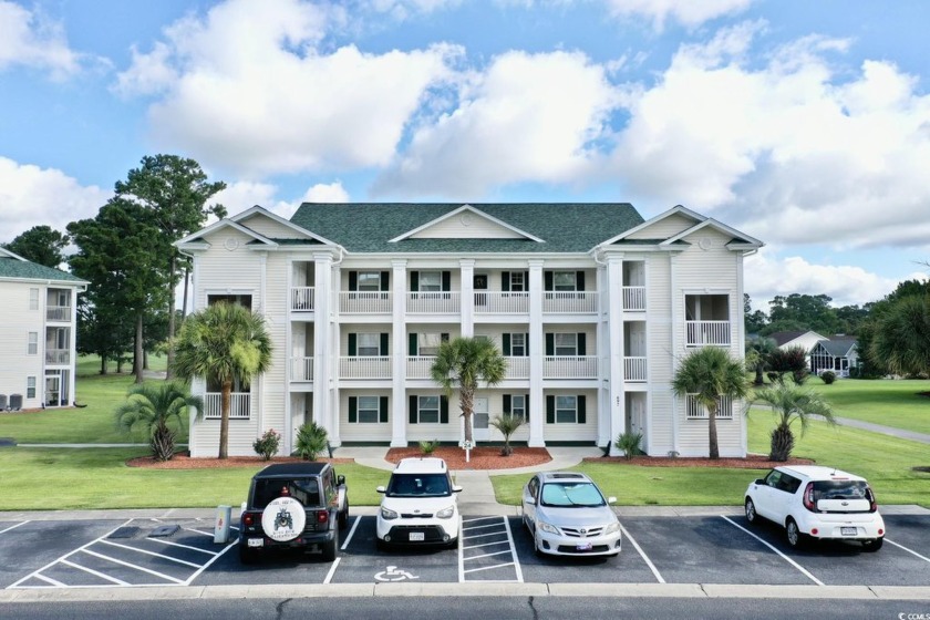 This stunning END UNIT boasts beautiful views of the Aberdeen - Beach Condo for sale in Longs, South Carolina on Beachhouse.com