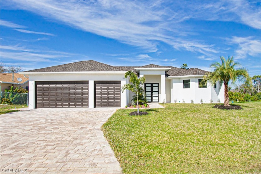 Brand new pool home on canal wit concrete seawall, featuring - Beach Home for sale in Cape Coral, Florida on Beachhouse.com