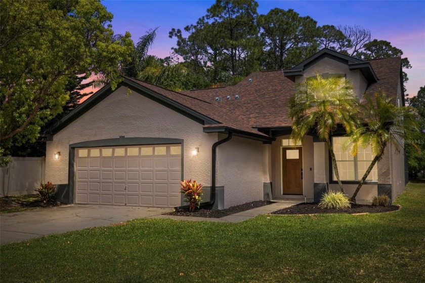 Come explore this lovely 4 BR, 2.5 BA home boasting with - Beach Home for sale in Palm Harbor, Florida on Beachhouse.com