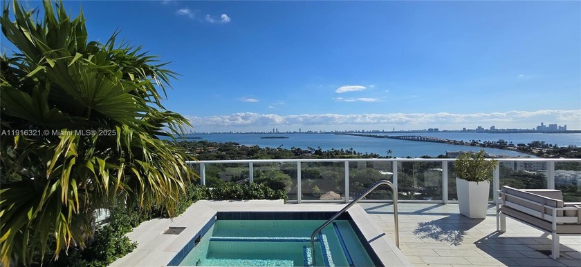 Biscayne Bay, lush foliage, and skyline views from your kitchen - Beach Condo for sale in Miami, Florida on Beachhouse.com