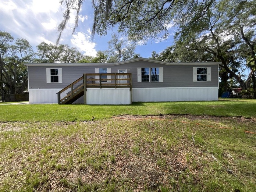 Enjoy peace of mind with this BRAND NEW CONSTRUCTION, 4 bedroom - Beach Home for sale in Gibsonton, Florida on Beachhouse.com