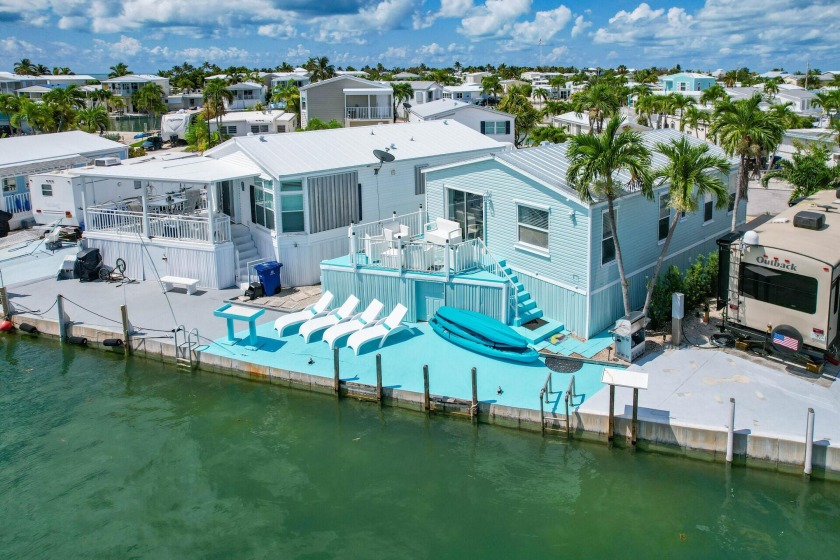 Welcome to this completely remodeled, direct canal front cottage - Beach Home for sale in Cudjoe Key, Florida on Beachhouse.com