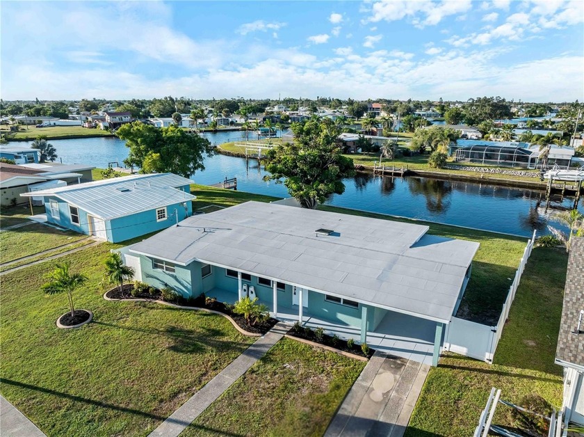 Beautifully renovated 4-bedroom, 2-bath waterfront home just - Beach Home for sale in Port Charlotte, Florida on Beachhouse.com