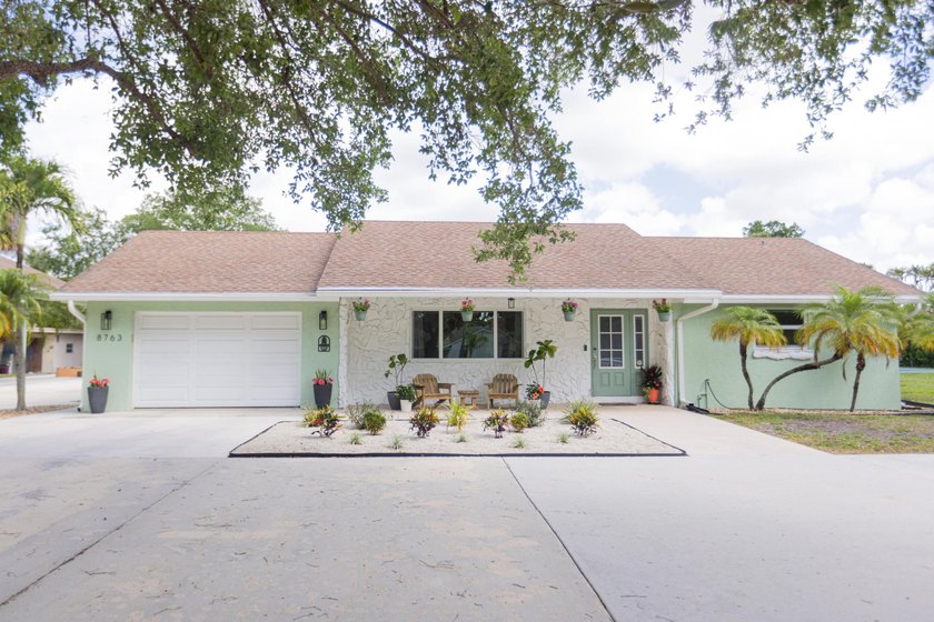 Welcome to your private acre retreat in the highly sought after - Beach Home for sale in Lake Worth, Florida on Beachhouse.com