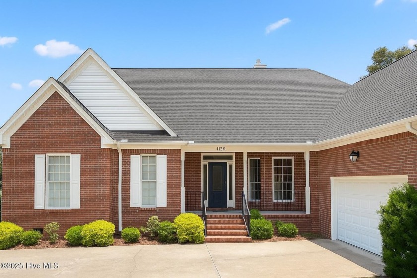 Welcome a stunning 3,185 sq ft custom-built, brick home on a - Beach Home for sale in Hampstead, North Carolina on Beachhouse.com