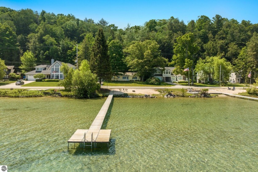 Welcome to your serene escape at the edge of Crystal Lake! This - Beach Home for sale in Frankfort, Michigan on Beachhouse.com