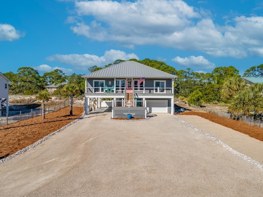Experience the epitome of coastal living in this stunning 2017 - Beach Home for sale in St. George Island, Florida on Beachhouse.com