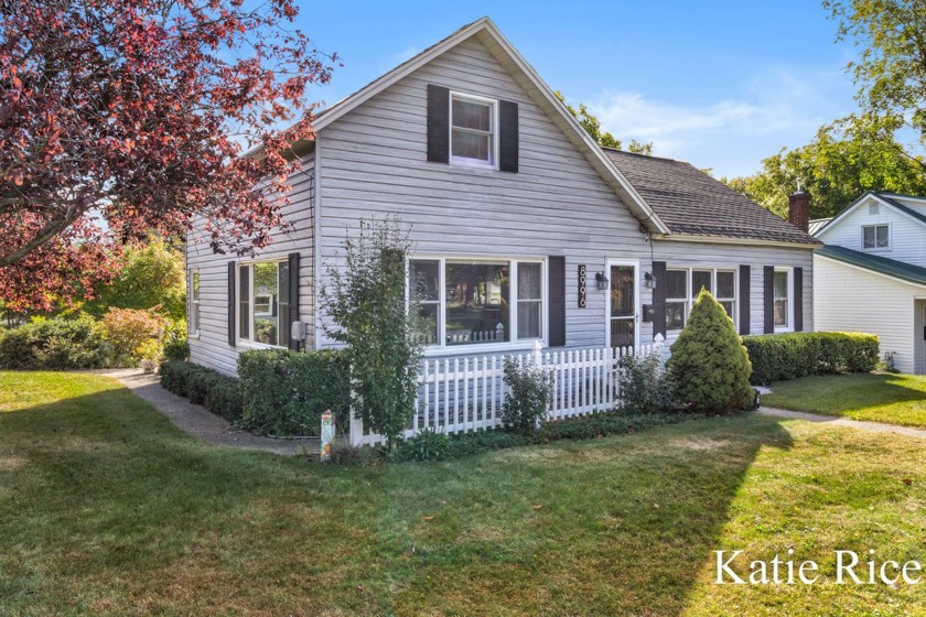 Darling, lovingly cared for home nestled on a double lot. This - Beach Home for sale in Montague, Michigan on Beachhouse.com