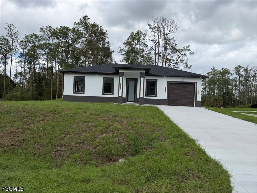 A home built in 2026 in an excellent location, featuring a - Beach Home for sale in Lehigh Acres, Florida on Beachhouse.com