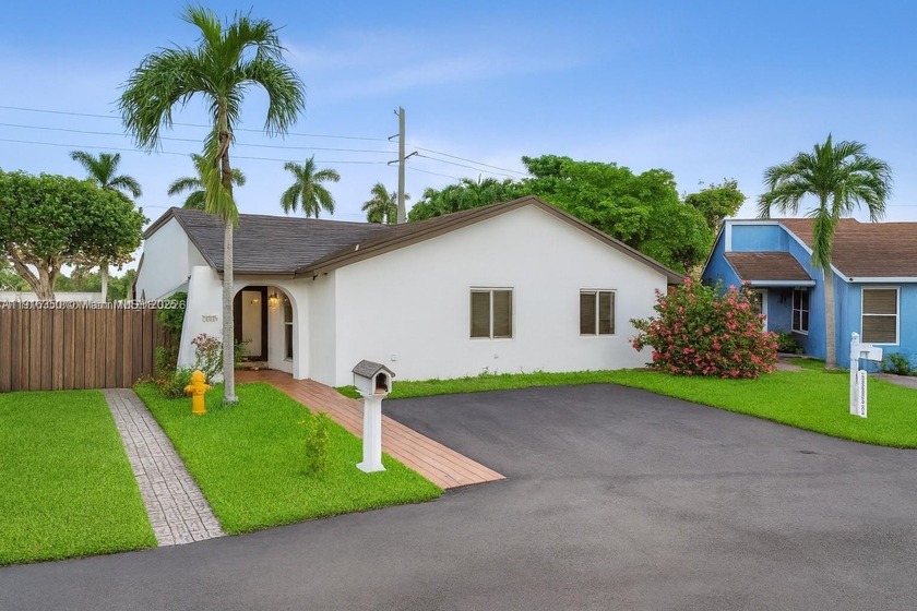 This beautifully updated one-story home offers 4 bedrooms and 2 - Beach Home for sale in Miami, Florida on Beachhouse.com