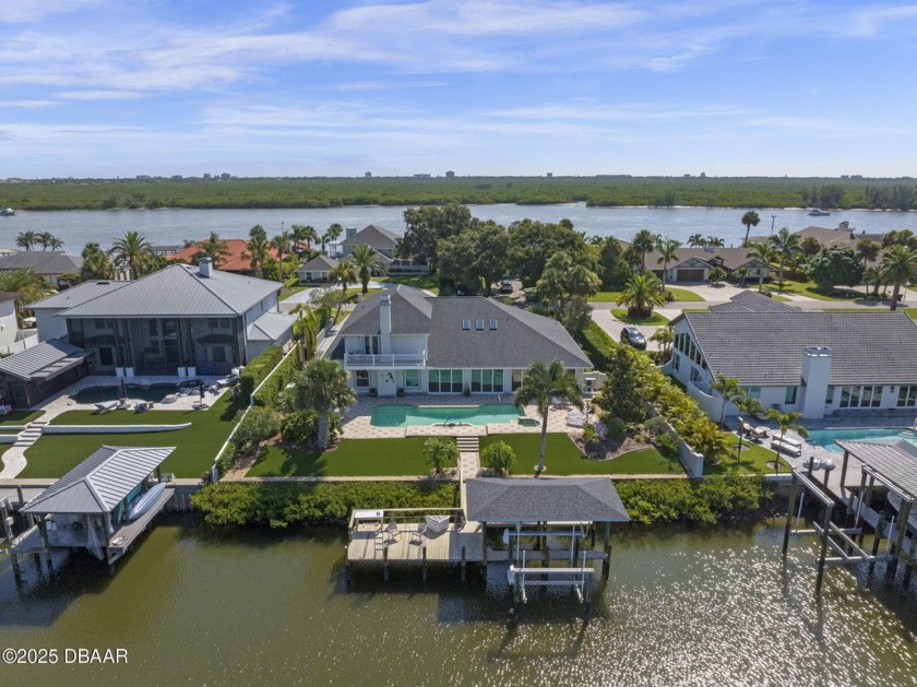 Discover a rare opportunity to own a CUSTOM-RENOVATED luxury - Beach Home for sale in New Smyrna Beach, Florida on Beachhouse.com