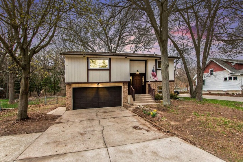 Welcome to this delightful 3-bedroom, 1.5-bath bi-level home set - Beach Home for sale in Holland, Michigan on Beachhouse.com