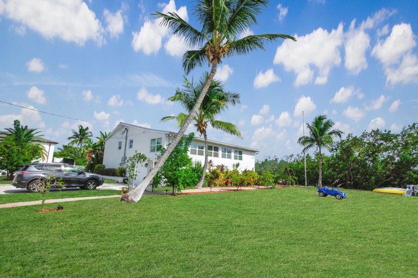 This multifamily duplex-style home with a bonus suite has been - Beach Home for sale in Geiger Key, Florida on Beachhouse.com