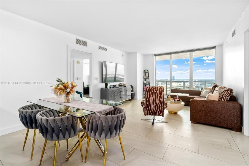 This stunning 2-bedroom unit with a den boasts beautiful - Beach Condo for sale in Hallandale Beach, Florida on Beachhouse.com