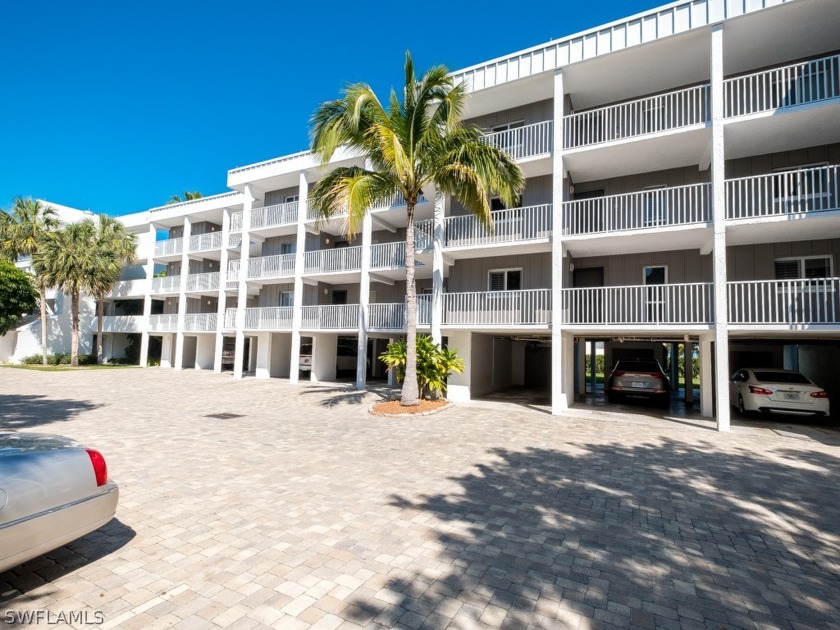 Enjoy countless days on the beach or watching the waves from - Beach Condo for sale in Sanibel, Florida on Beachhouse.com