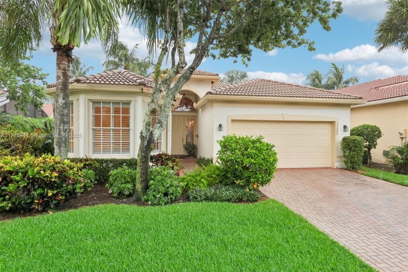 Discover this stunning 4-bedroom, 2.5-bath lakefront home in an - Beach Home for sale in Delray Beach, Florida on Beachhouse.com