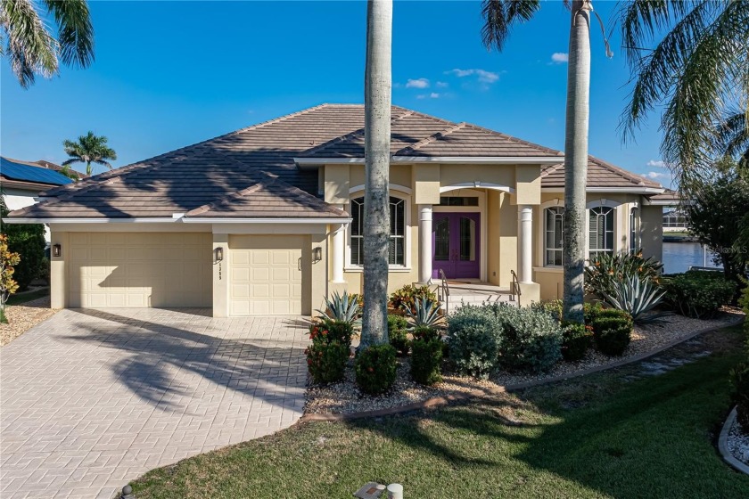 EXCEPTIONAL PGI HOME WITH 173FT OF SEAWALL & QUICK SAIL ACCESS - Beach Home for sale in Punta Gorda, Florida on Beachhouse.com