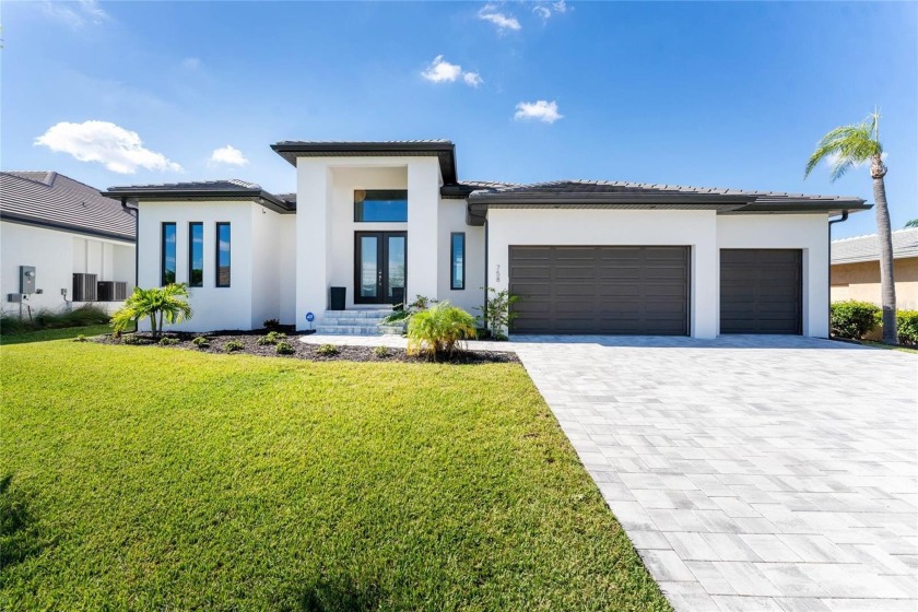 Embrace the coastal Florida lifestyle in this stunning 2,622 sq - Beach Home for sale in Punta Gorda, Florida on Beachhouse.com
