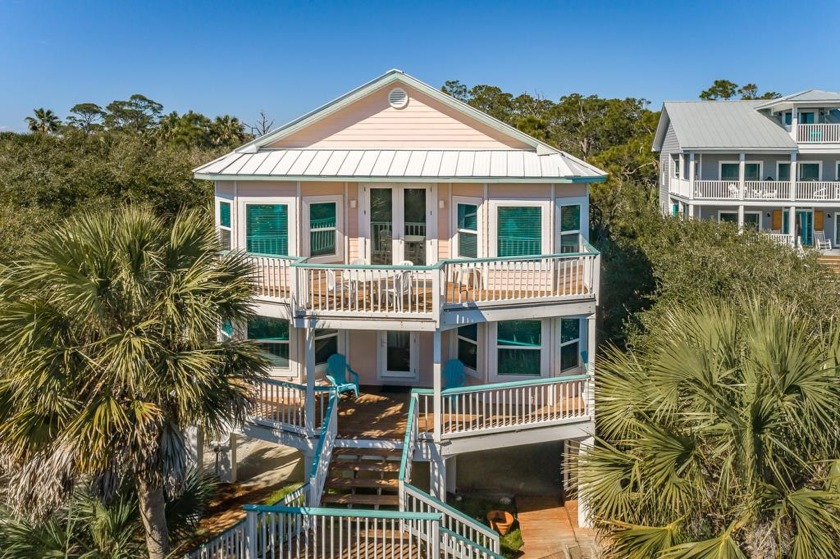 Experience coastal living at its finest in *Palm Hammock* - Beach Home for sale in St. George Island, Florida on Beachhouse.com