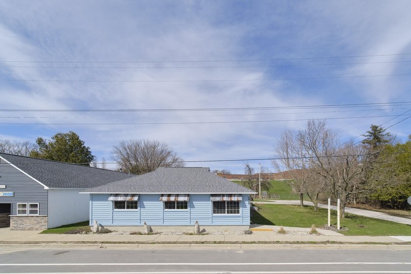 Prime M-22 Investment Opportunity in Onekama's ''Two Lake - Beach Home for sale in Onekama, Michigan on Beachhouse.com