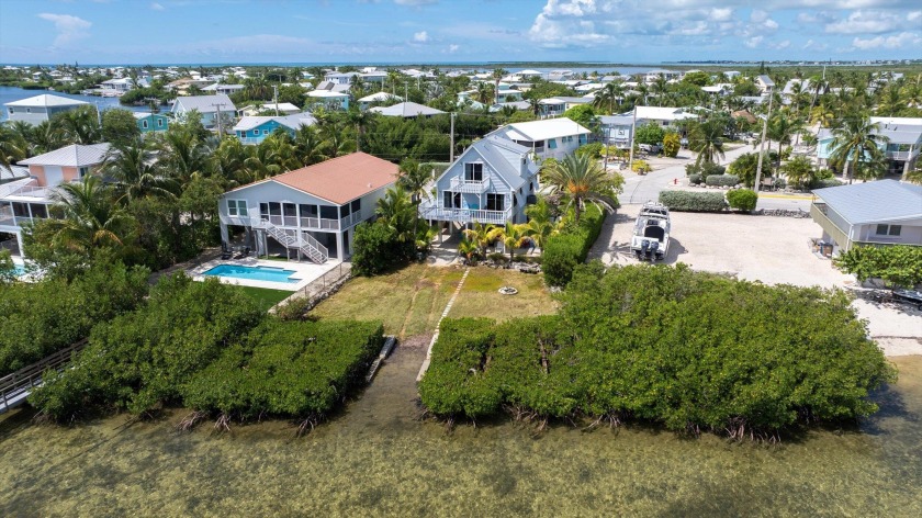 Welcome to your open-water paradise! This 3-bedroom, 2-bath home - Beach Home for sale in Ramrod Key, Florida on Beachhouse.com