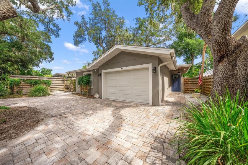 Discover this ultra private gem where luxury meets charm in this - Beach Home for sale in Sarasota, Florida on Beachhouse.com