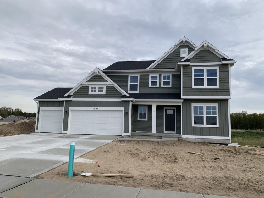New Construction! Home is complete! Interra Homes presents ''The - Beach Home for sale in Grand Haven, Michigan on Beachhouse.com