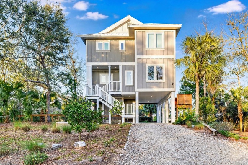 Beloved, scenic riverfront paradise in Apalachicola! This - Beach Home for sale in Apalachicola, Florida on Beachhouse.com