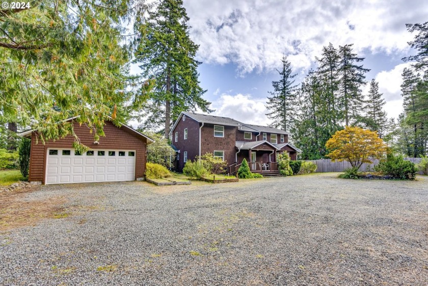 Situated in a quiet neighborhood, this 2,579 sf. ft. home blends - Beach Home for sale in Nehalem, Oregon on Beachhouse.com