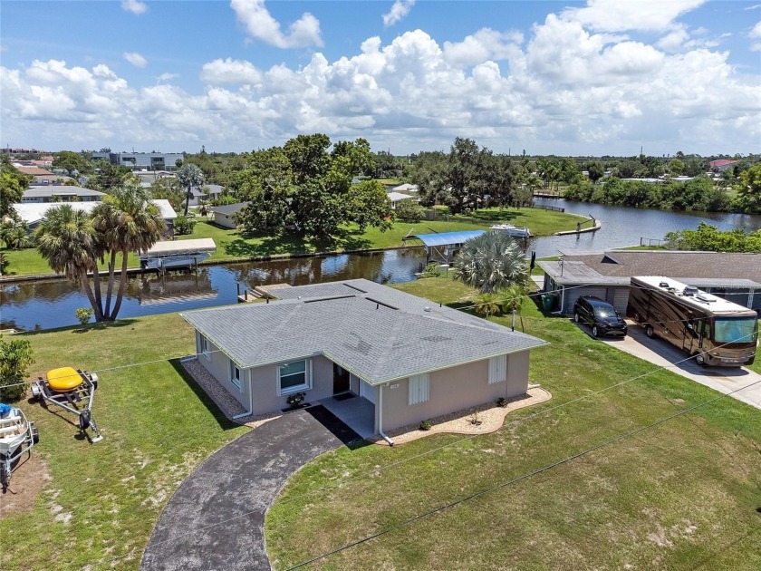 Absolutely stunning remodeled waterfront home! As you step - Beach Home for sale in Port Charlotte, Florida on Beachhouse.com