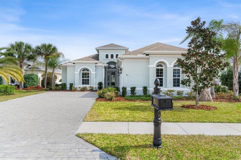 Welcome to 82 N Lakewalk Drive, a beautifully maintained Palm - Beach Home for sale in Palm Coast, Florida on Beachhouse.com