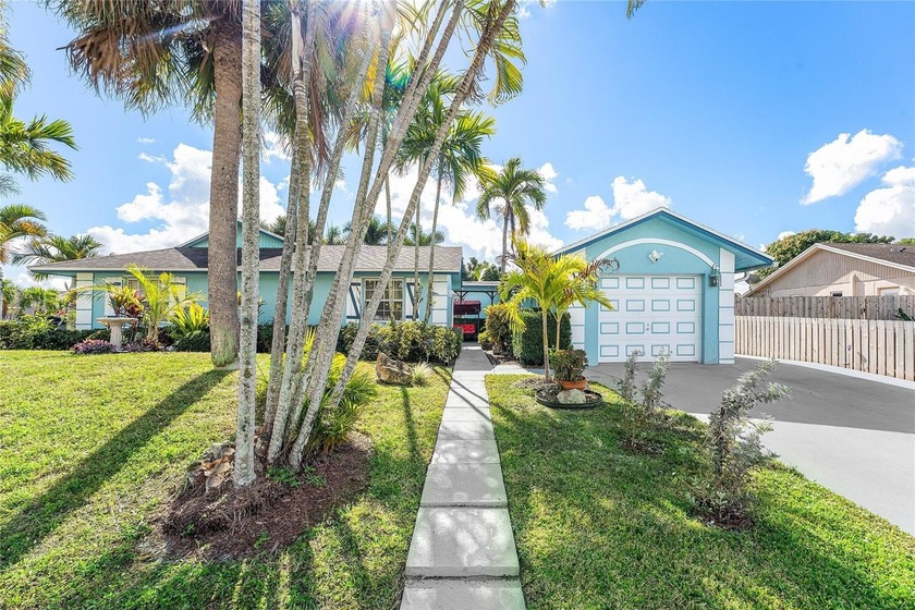 Welcome to this well located single family home in Royal Palm - Beach Home for sale in Royal Palm Beach, Florida on Beachhouse.com
