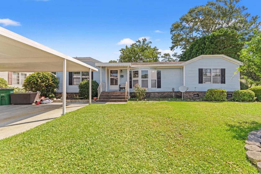 Welcome to 1715 Clubhouse Drive, located in the quiet, gated - Beach Home for sale in Myrtle Beach, South Carolina on Beachhouse.com