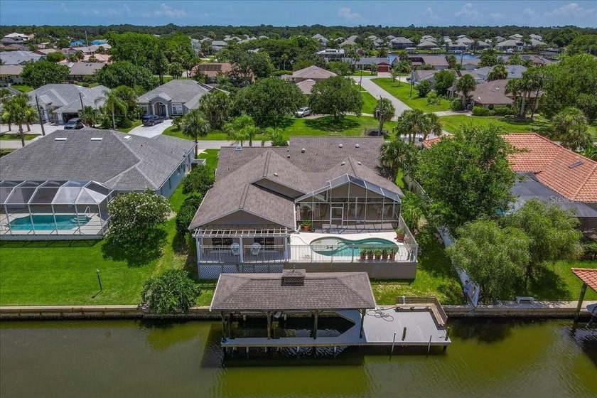 Nestled in the highly sought-after Sailboat Country, this - Beach Home for sale in Palm Coast, Florida on Beachhouse.com