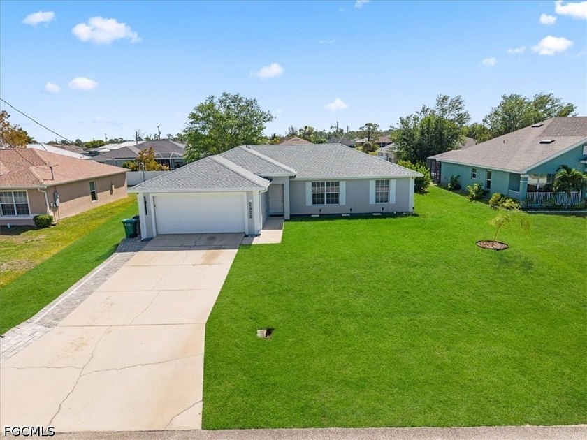 Welcome to this beautifully maintained 4-bedroom, 2-bath home - Beach Home for sale in Cape Coral, Florida on Beachhouse.com
