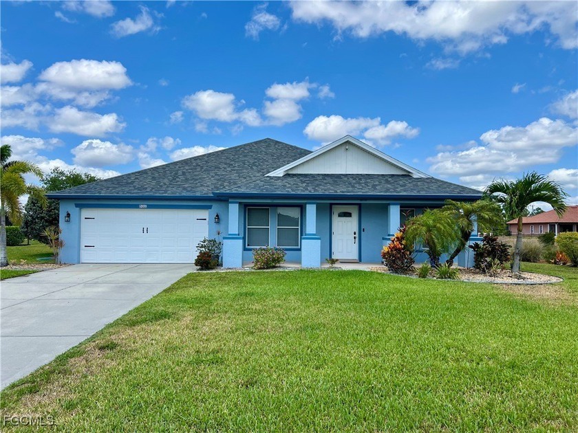 Pristine move in ready 3 bedroom home with a large den in the - Beach Home for sale in Lehigh Acres, Florida on Beachhouse.com