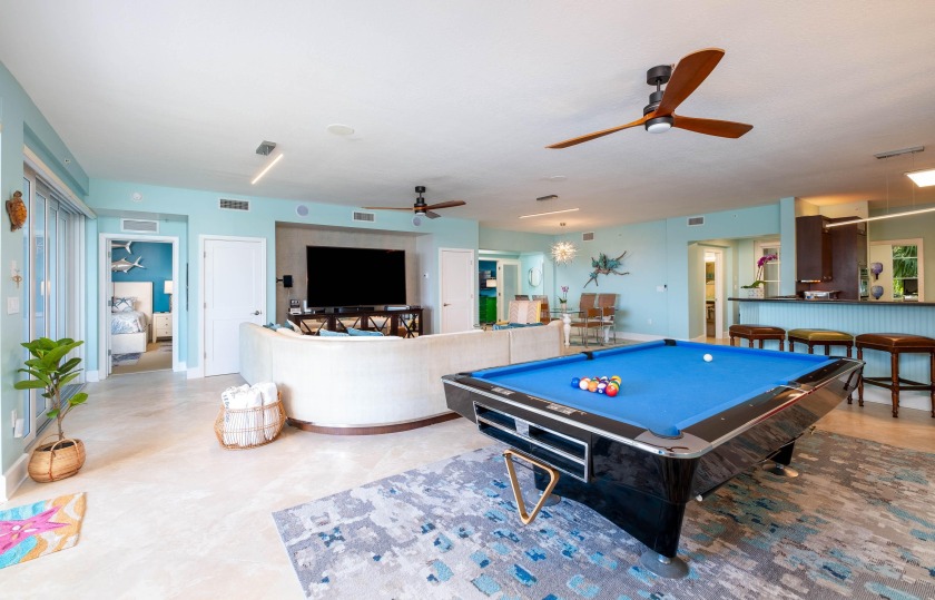 EXCLUSIVE FIVE-BEDROOM FLAGSHIP! Meet Hemingway's Hideaway - the - Beach Home for sale in Key Largo, Florida on Beachhouse.com