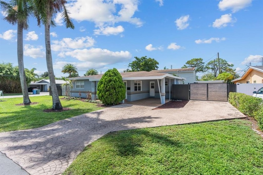This Beautifully Updated 4-Bedroom, 3-Bathroom Home Offers 1618 - Beach Home for sale in Oakland Park, Florida on Beachhouse.com