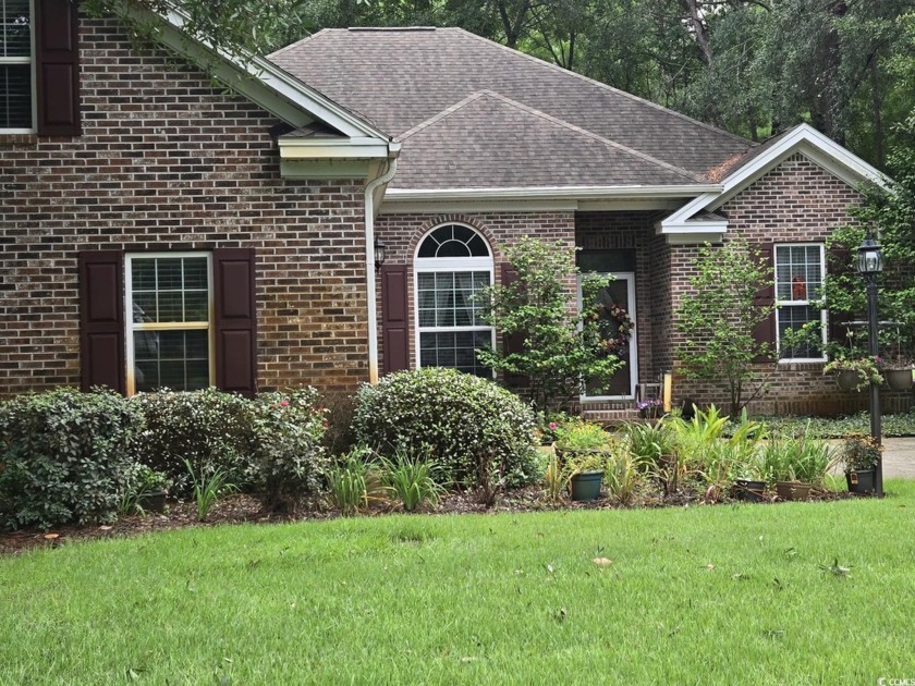 Nestled within the serene and prestigious community of The River - Beach Home for sale in Pawleys Island, South Carolina on Beachhouse.com