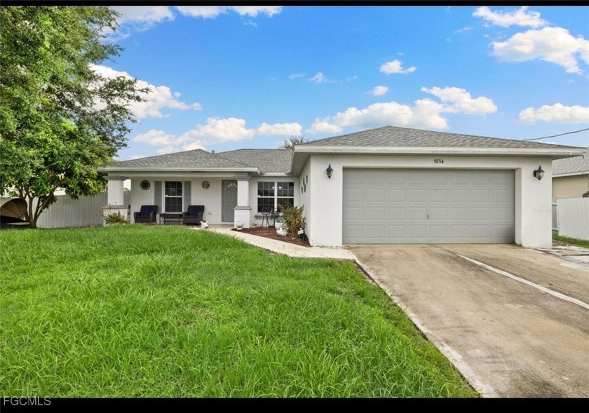Welcome to 5034 Benton St, Lehigh Acres! Built in 2004, this - Beach Home for sale in Lehigh Acres, Florida on Beachhouse.com