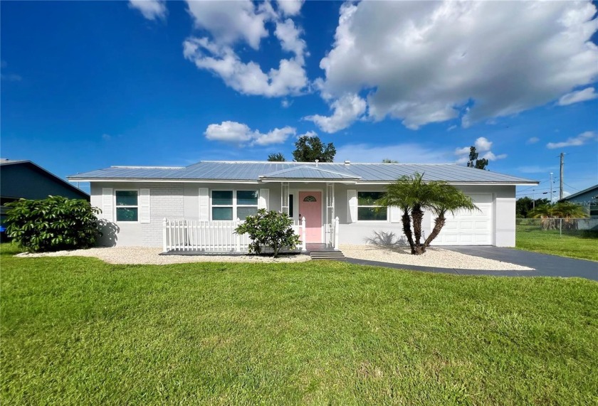 NO FLOOD DAMAGE HERE!  Home has been recently updated with fresh - Beach Home for sale in Punta Gorda, Florida on Beachhouse.com