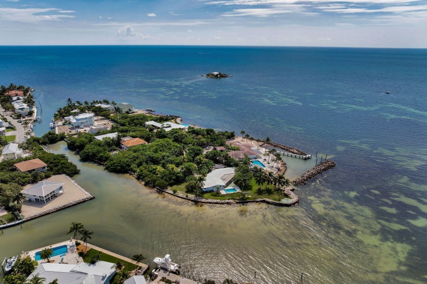 Nestled on the protected side of a peninsula within an exclusive - Beach Home for sale in Marathon, Florida on Beachhouse.com