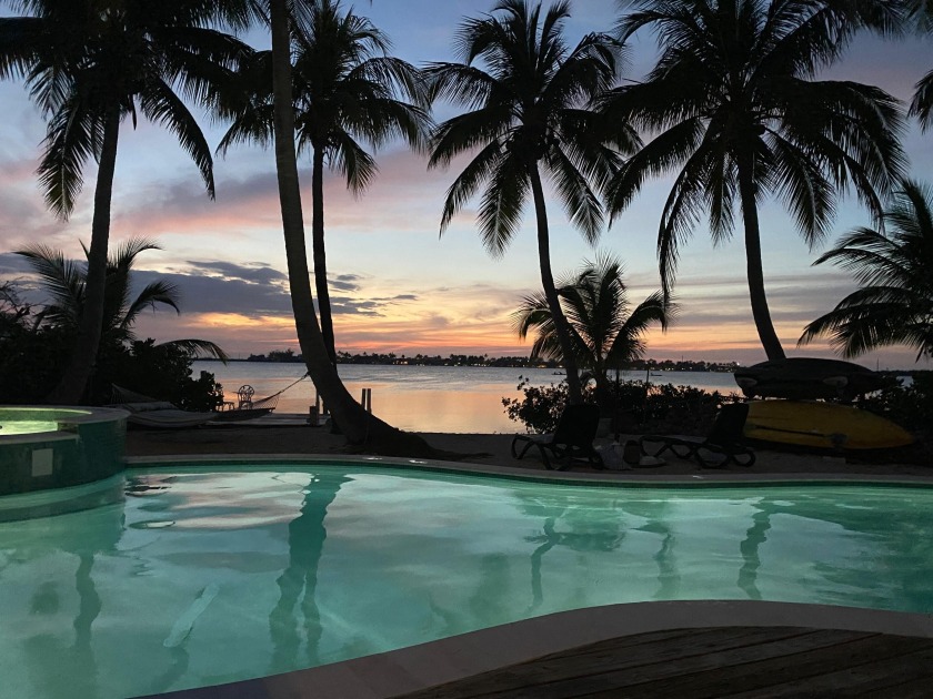 Set on a quater-acre lot in Bay Point, a quiet residential - Beach Home for sale in Saddlebunch, Florida on Beachhouse.com