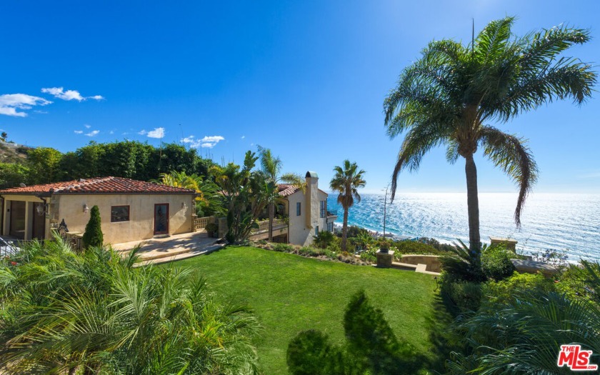 This Tuscan-inspired estate encompasses nearly 5,000 square feet - Beach Home for sale in Malibu, California on Beachhouse.com