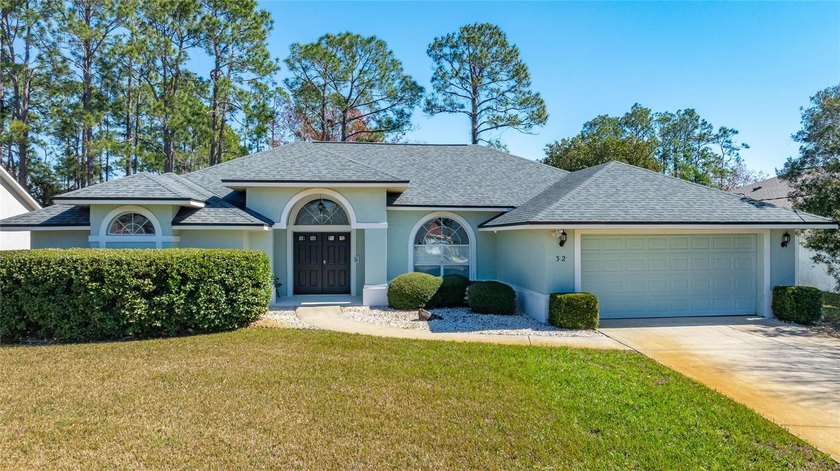 Welcome to this beautiful Palm Coast Property-- where everyday - Beach Home for sale in Palm Coast, Florida on Beachhouse.com